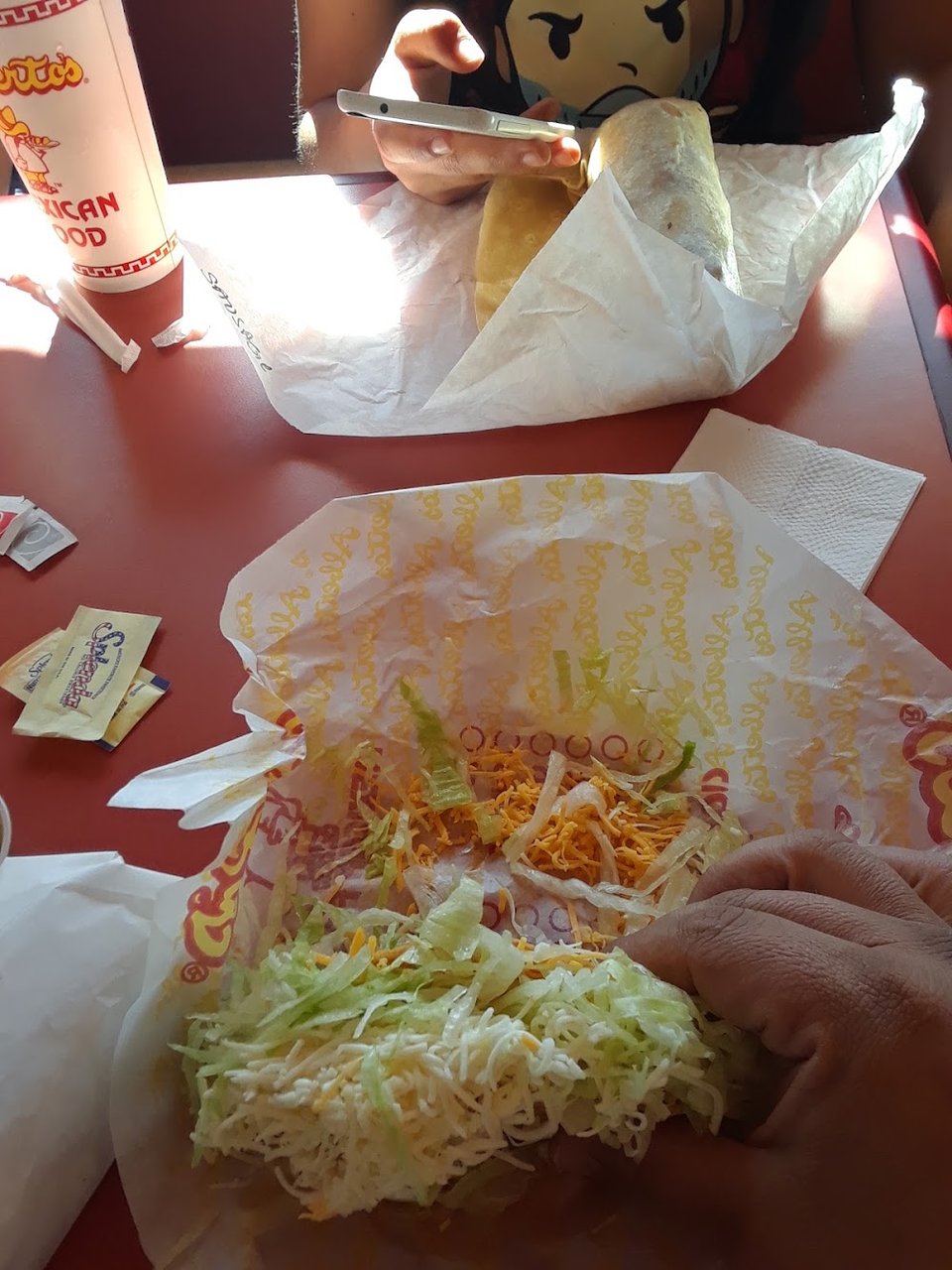 Printed menu showing combination plates and fries.