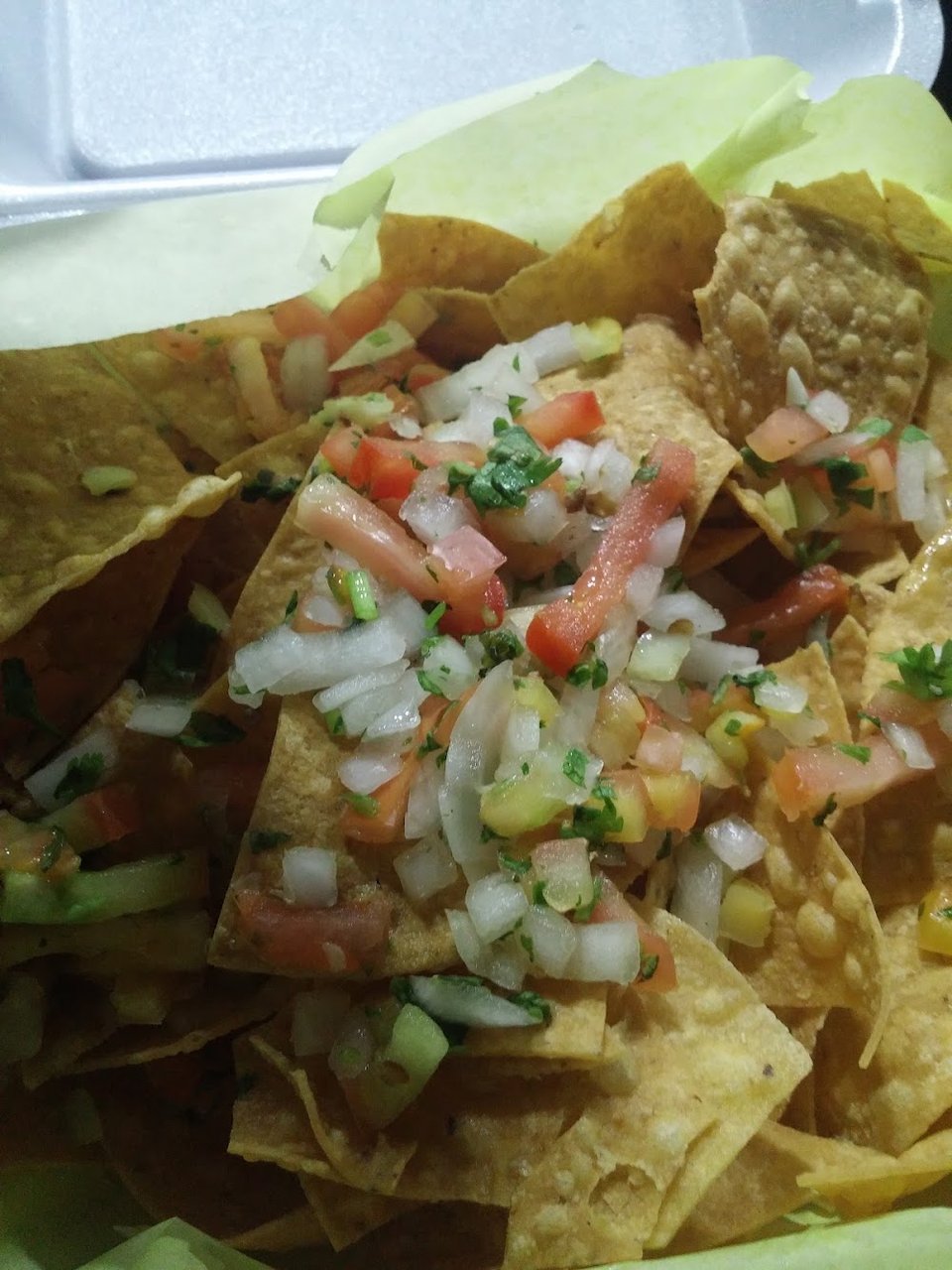 Menu display with burritos and tostadas.