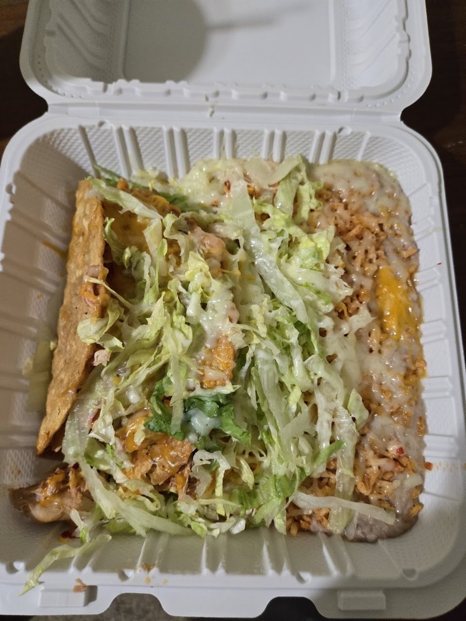 Printed menu showing combination plates and fries.