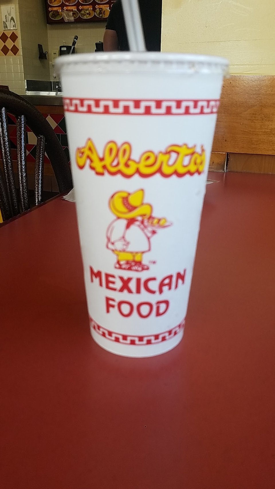Restaurant menu with Mexican dishes listed.