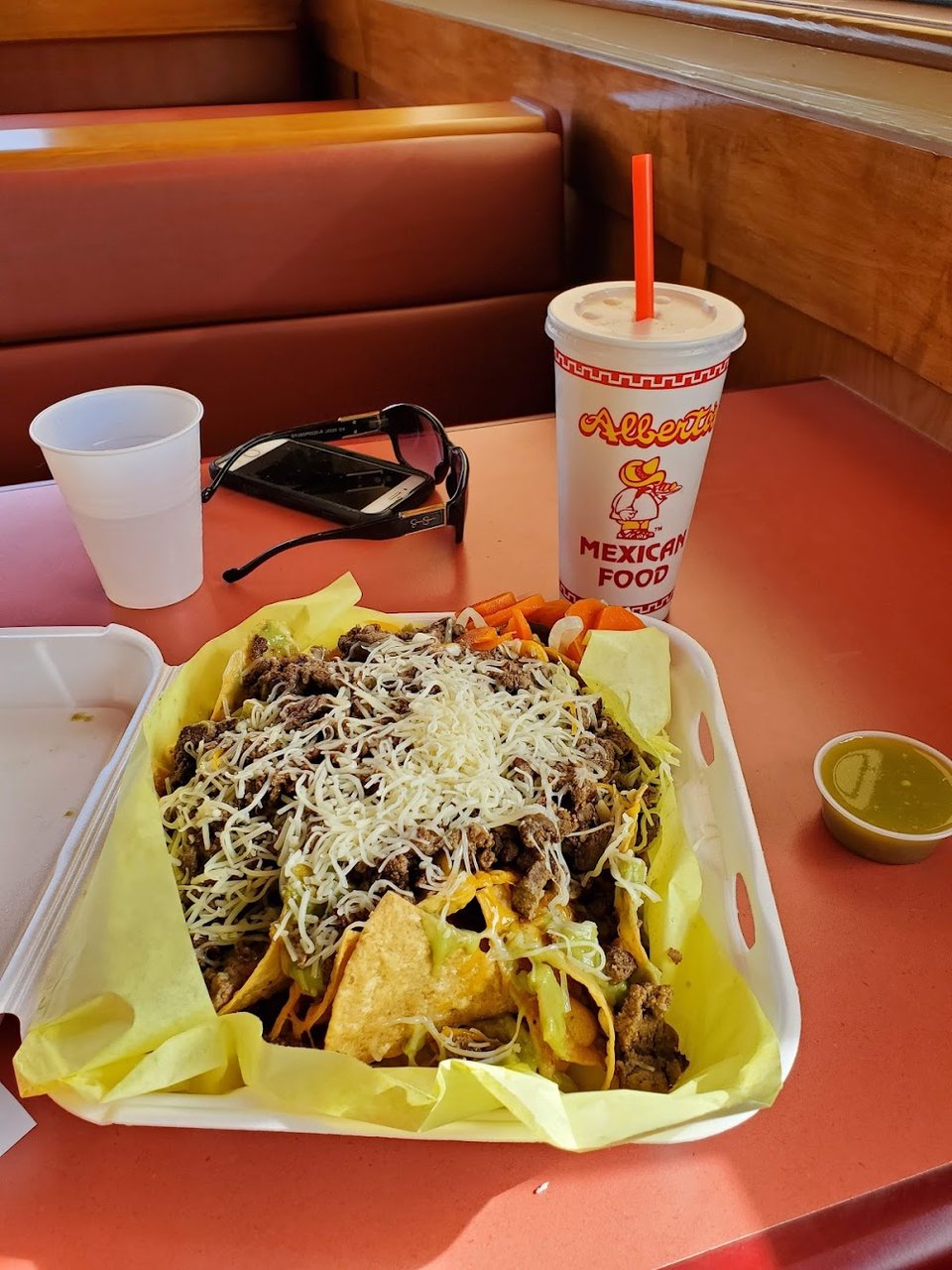 Menu display with burritos and tostadas.