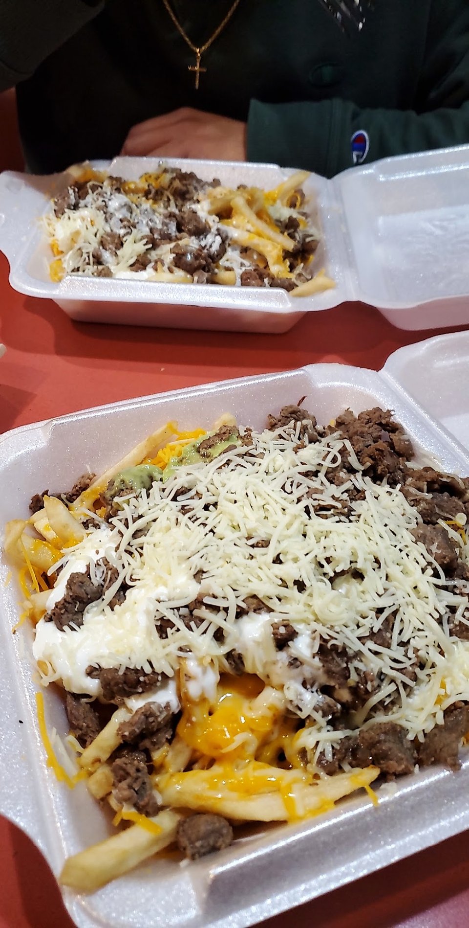 Printed menu showing combination plates and fries.