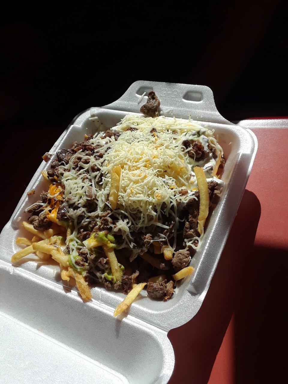Menu display with burritos and tostadas.